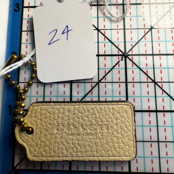 Coach Accessories - Coach Cream Leather Keychain